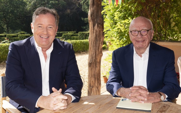 Piers Morgan sitting with Rupert Murdoch in 2022 