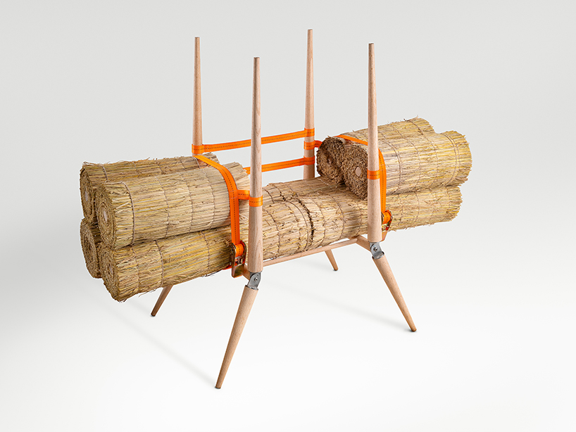 rice straw bundles atop wooden A-frame craft jige-inspired chair by sukchulmok 