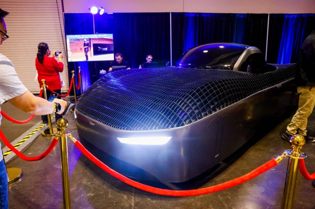 Visitors look at the Alef Model A flying car on display during the 2025 Silicon Valley Auto Show at the Santa Clara Convention Center in Santa Clara, Calif., on Friday, Feb. 21, 2025. Attendees explored the latest vehicles from 17 manufacturers, the chance for test drives, and a demo of a TOboR Home Dog. The show runs from Friday, Feb. 21, through Sunday, Feb. 23. (Ray Chavez/Bay Area News Group)