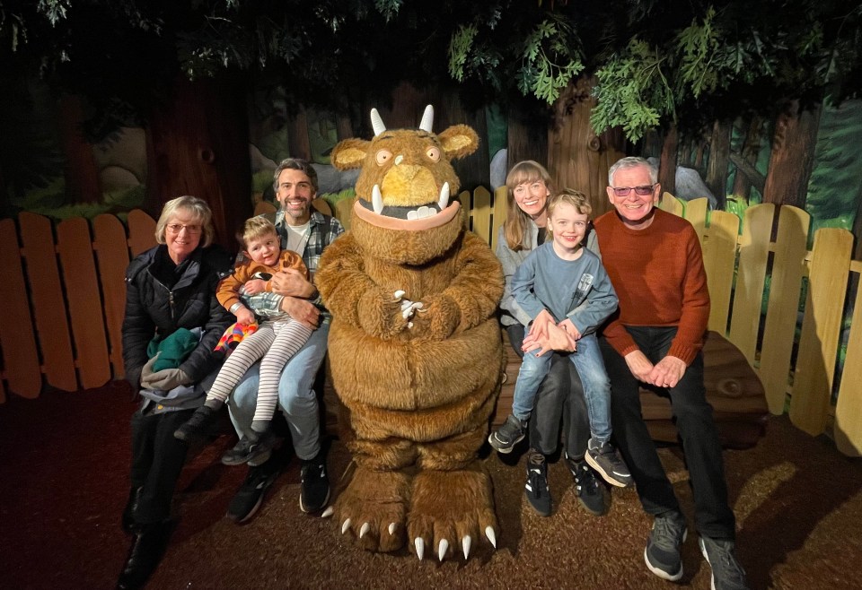 Family posing with the Gruffalo.