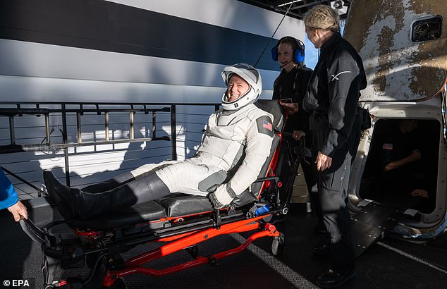 After splashing down off the coast of Tallahassee, Florida Williams and Wilmore were helped onto stretchers by NASA's recovery crew. This is standard practice for astronauts whose muscles have been weakened by their time in microgravity