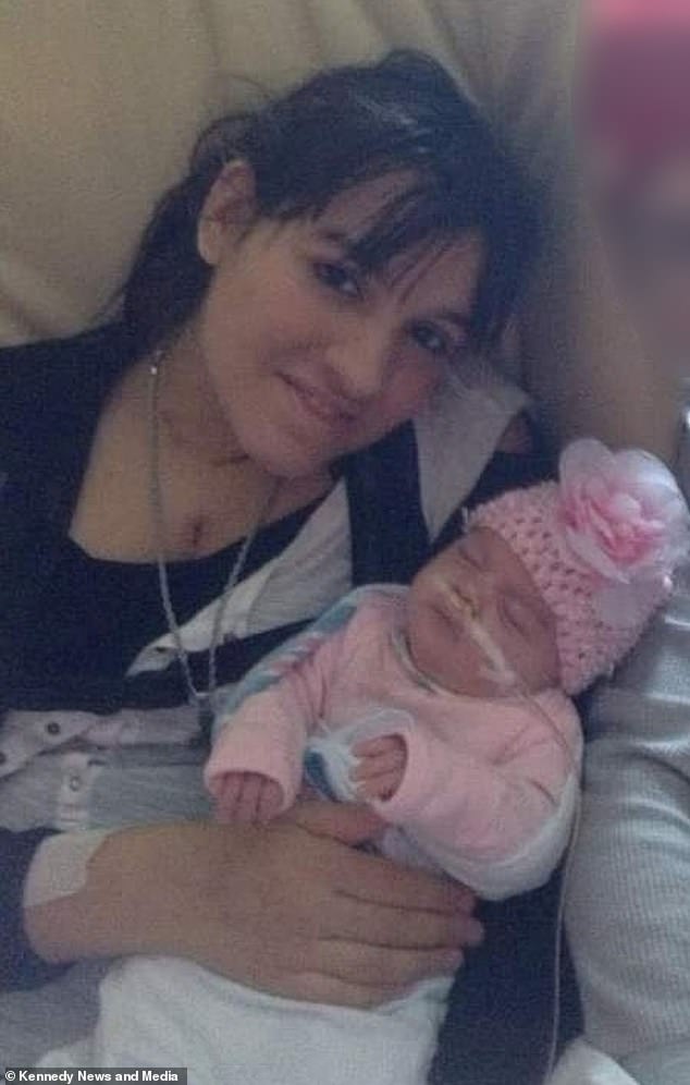 Masterpole, pictured with her daughter when she was a newborn, remains on the heart transplant wait list