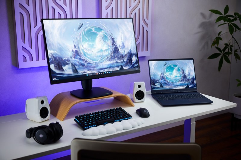 Alienware 16 Aurora laptop next to a new gaming screen.