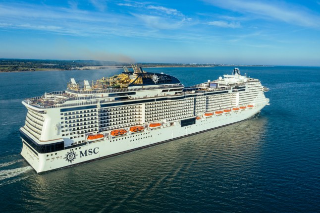 The MSC Virtuosa cruise ship on the sea, leaving Southampton port.
