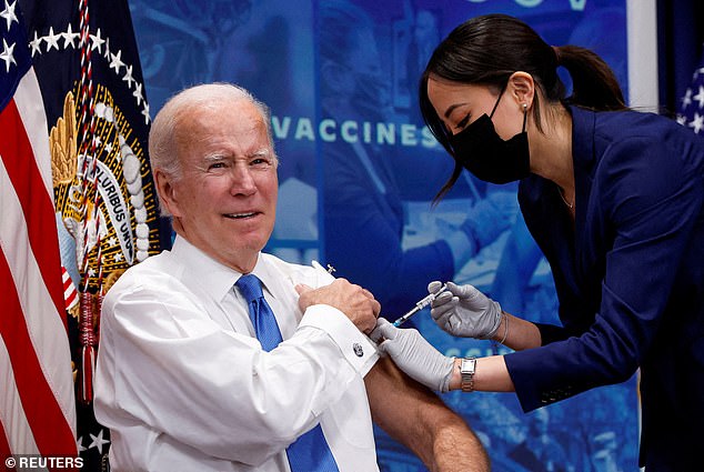 The FDA has revealed an overhaul to its Covid vaccine policy. Pictured above is Biden getting an updated Covid vaccine in 2022