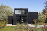 At just more than 500 square feet, the Patio Home is the largest of the Cȃpsula trio. It sleeps four, has a kitchen and bathroom, and is equipped with a combination of sliding doors and large windows.