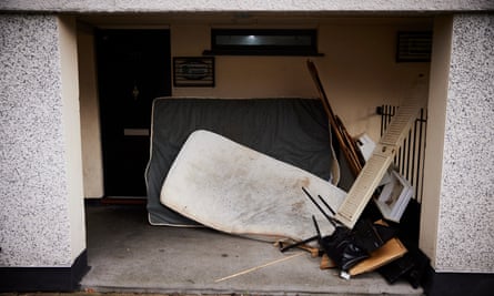 An old mattress and other items outside a flat on the Freehold estate in Rochdale