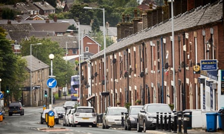 ‘In Greater London, average advertised rent is just over 16% higher than it was a year ago; in Manchester, the figure is 20.5%.’ Terrace houses in Oldham, Greater Manchester.