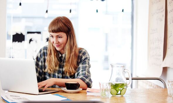 Woman looking at a laptop