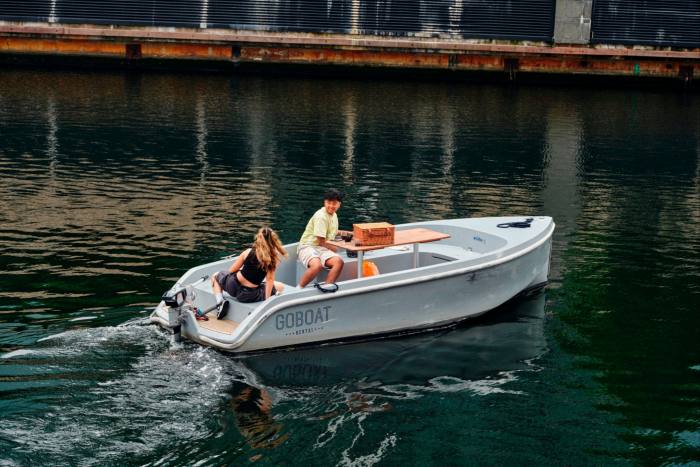 People on a rental boat near Canary Wharf