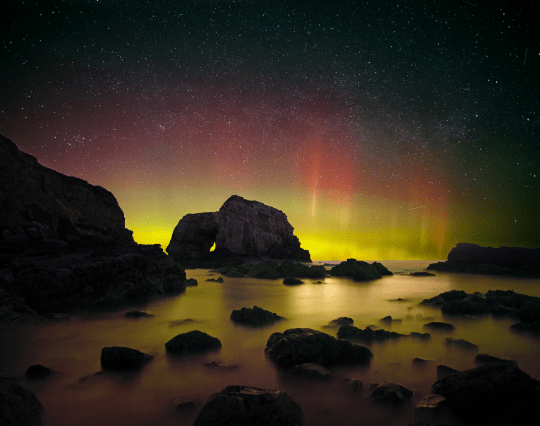 The Northern Lights over the Great Pollet Sea Arch