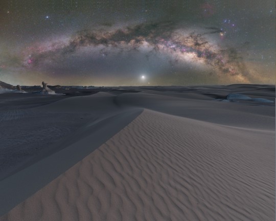 The Milky Way over the White Desert National Park, Egypt. Venus is clearly seen just above the horizon 