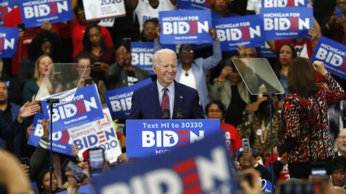 FILE - In this March 9, 2020, file photo Democratic presidential candidate former Vice President Joe Biden speaks during a campaign rally at Renaissance High School in Detroit. Given Biden’s uneven performance as a campaigner throughout the Democratic primary, some in the party are content to have the former vice president keeping a lower profile for now, though they know it’s not a dynamic that can sustain itself as Election Day draws closer.  (AP Photo/Paul Sancya, File)