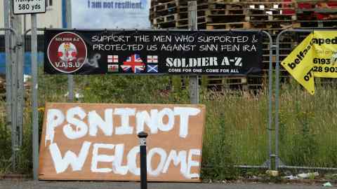 Warning signs for the Police Service of Northern Ireland along the Shankill Road, West Belfast