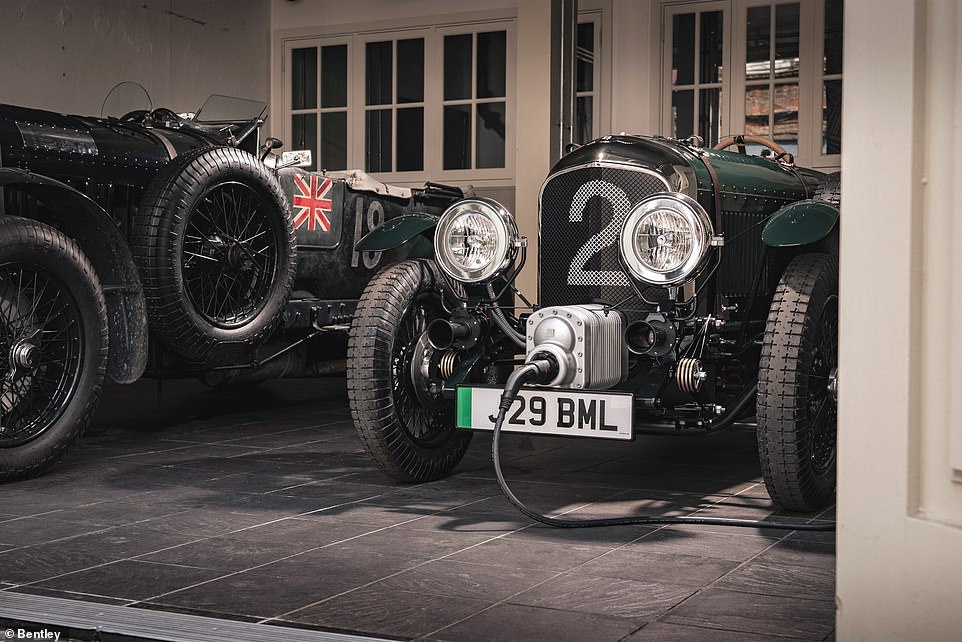 The electric charging port for the new, smaller baby Bentley is cunningly concealed within the mock 'supercharger' housing at the front of the battery-powered vehicle