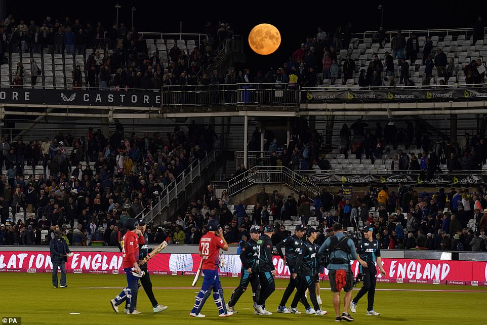 DURHAM: The Super Blue Moon is visible over the stands as the teams walk off after the first Vitality IT20 match at the Seat Unique Riverside, County Durham