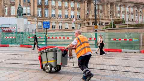 A Council refuse collector at work in Birmingham’s Victoria Square