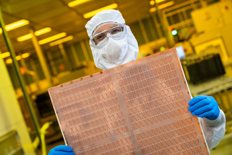 An Intel engineer holds a test glass core substrate panel at Intel's Assembly and Test Technology Development factories in Chandler, Arizona, in July 2023. Intel’s advanced packaging technologies come to life at the company's Assembly and Test Technology Development factories. (Credit: Intel Corporation)