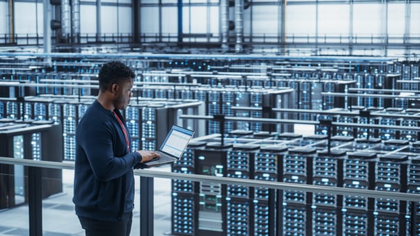 person overlooking a datacenter