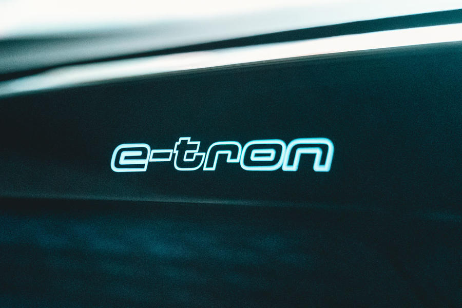 A white stencilled Audi E-tron logo inside the Audi E-tron GT