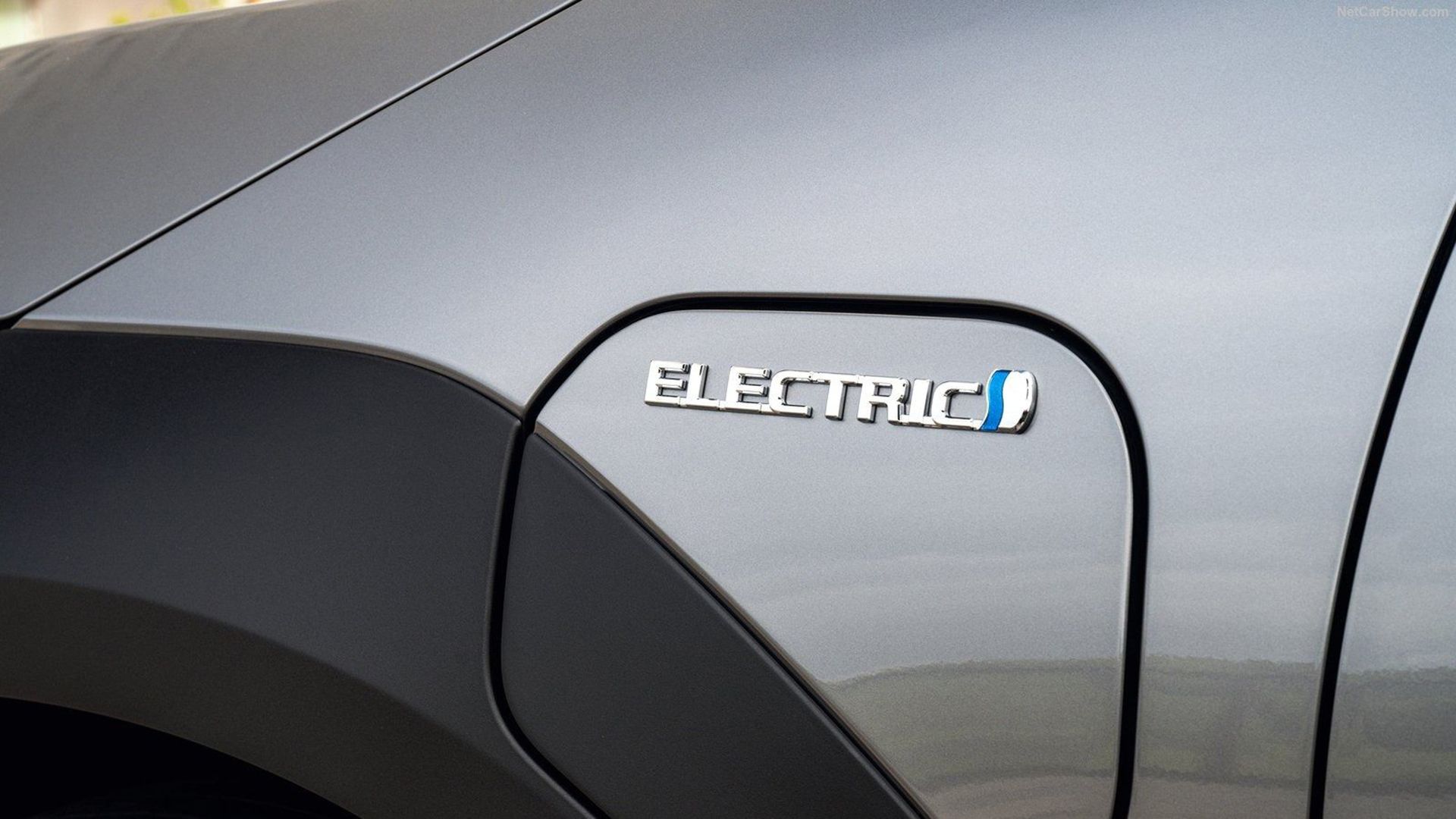 A close-up shot of the electric logo of the 2023 Toyota bZ4X.