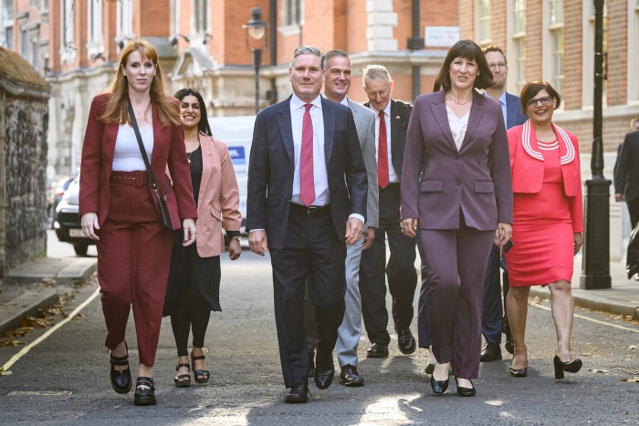 Sir Keir Starmer and other members of the Labour party walkl in London  