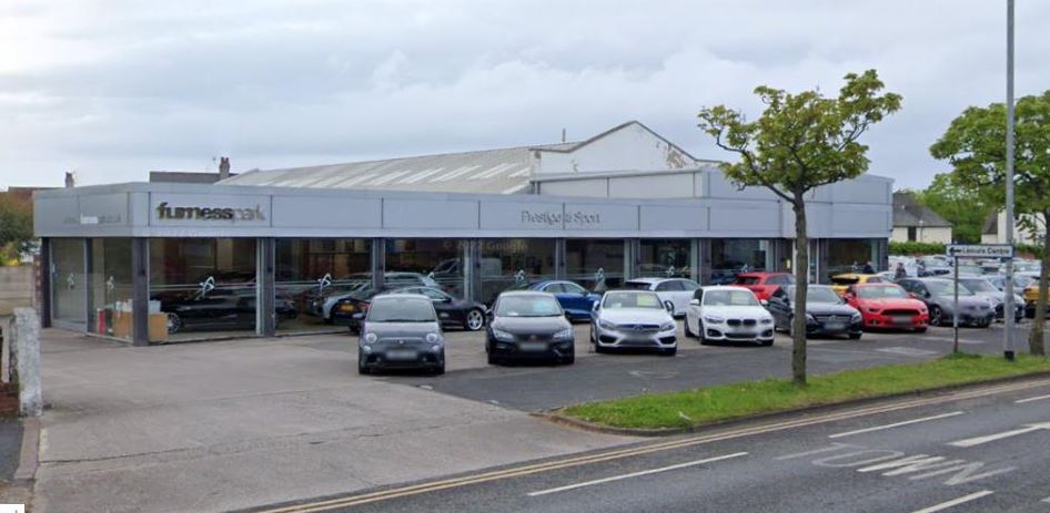 A much-loved car dealership in Cumbria has been forced to close