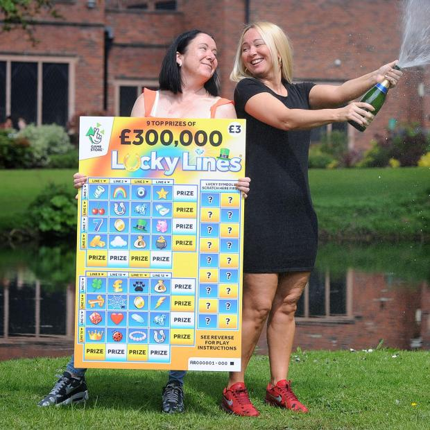 Lucy Dixon and her sister Annie accidentally tore a £300,000 winning National Lottery scratchcard