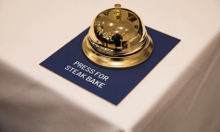 A bell sits on a sign reading ‘Press for steak bake’