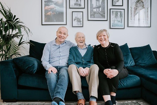 George Leeson with his son Ian and daughter Anne, a paediatric nurse from Lincoln, in December 2021