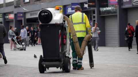 Worker cleans streets