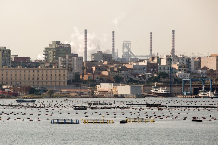 Smoke rises from the Ilva steel plant