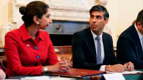 Rishi Sunak sits at the cabinet table next to Suella Braverman