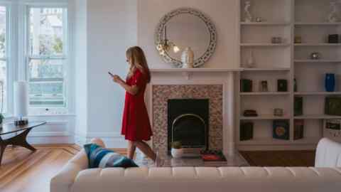 A realtor attends an open house at a home in San Francisco, California