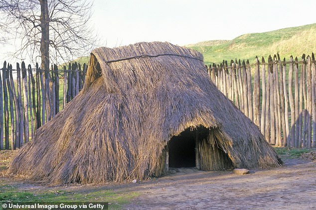 Above, a replica of a Cahokia style home