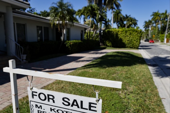 A ‘for sale’ sign outside the property