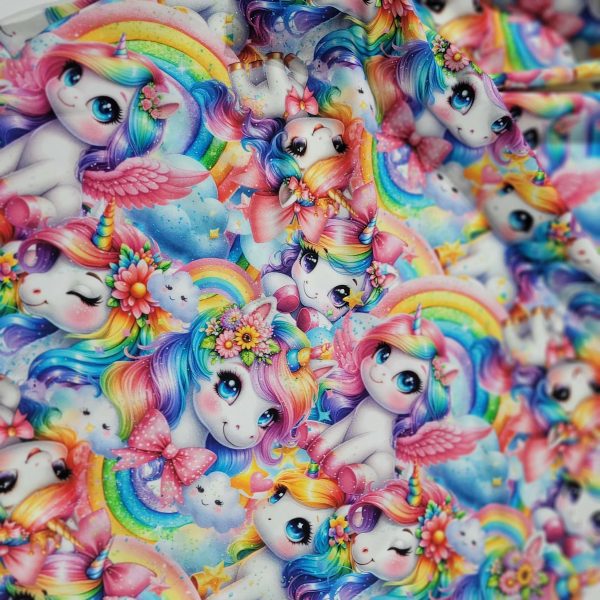 mössa pannband med unicorn och regnbåge
