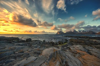 seascape with a rocky shore and clouds in the sky