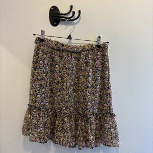 Brun/grön blommig kjol stl 164