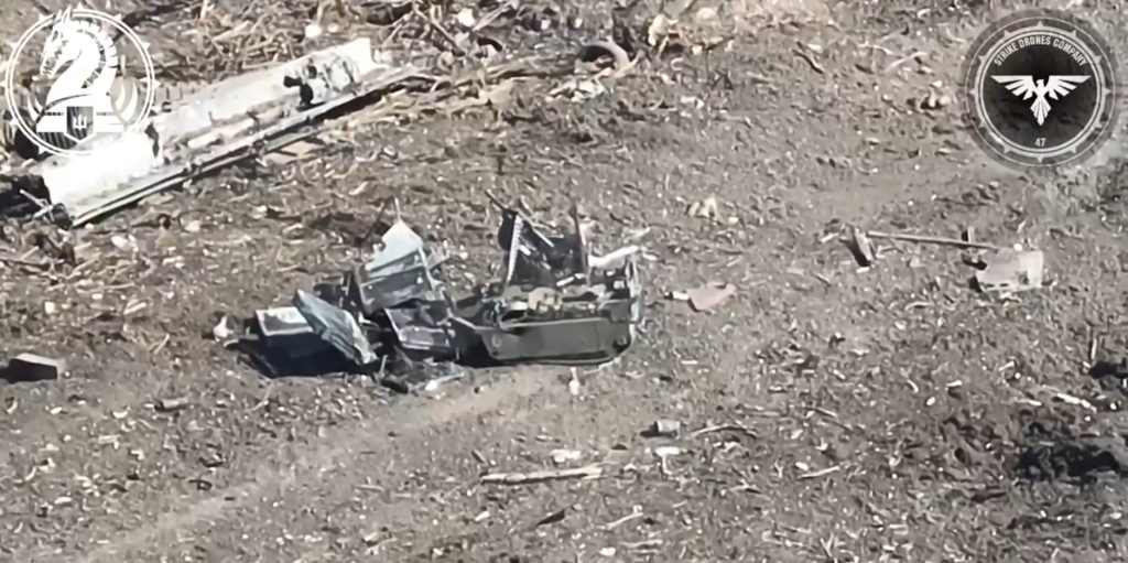 An FPV drone approaches an immobilised Courier UGV. 