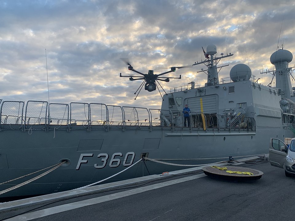 A drone carrying a Quadsat RF sensing payload.