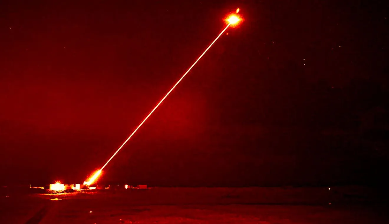 DragonFire high energy laser engaging a target at night.