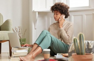 Young woman busy planning her relocation