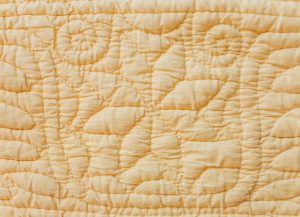 Hand quilted pointed star motif