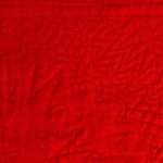 Zig-zag fan hand-quilted motif