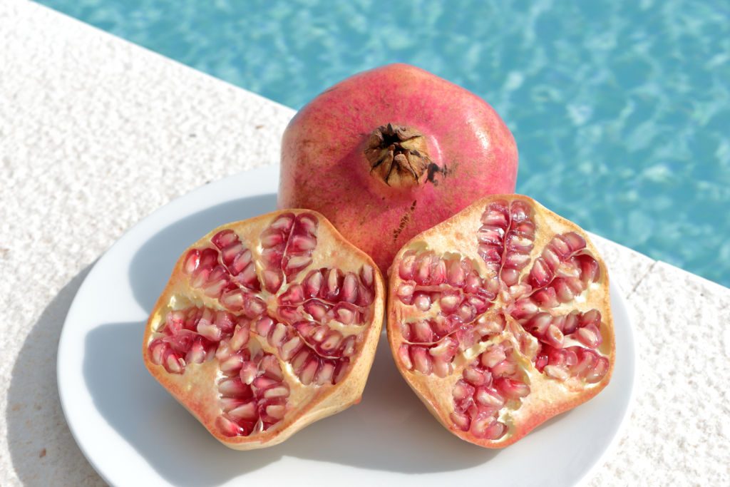 closeup pomegranate infinity pool