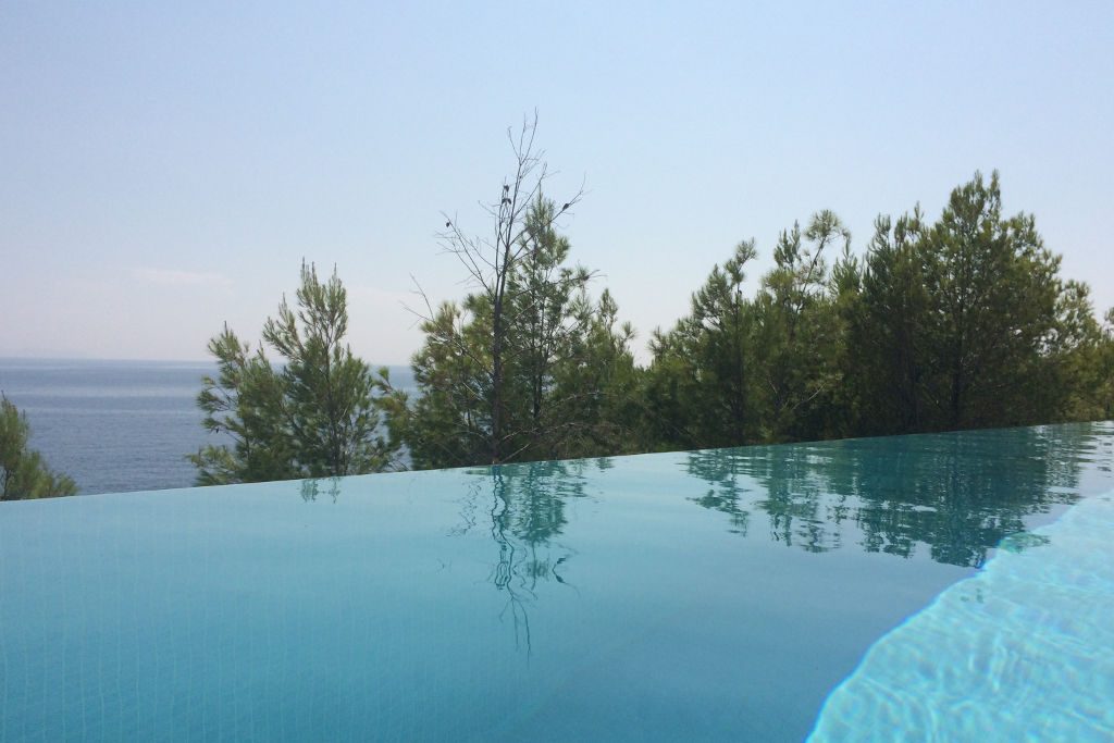 Luxury villa infinity pool sea view pine trees