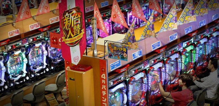 How do Pachinko players control the balls?