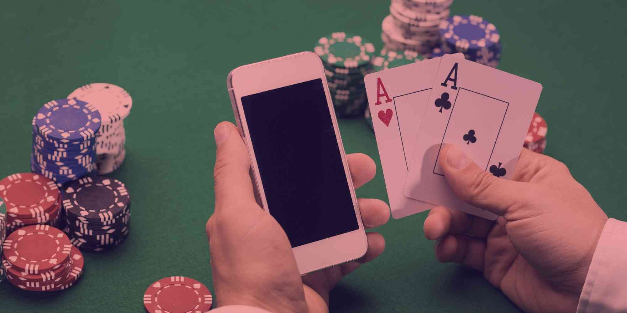 Is it acceptable to use electronic devices while gambling?