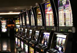 How are slot machines regulated in different jurisdictions?